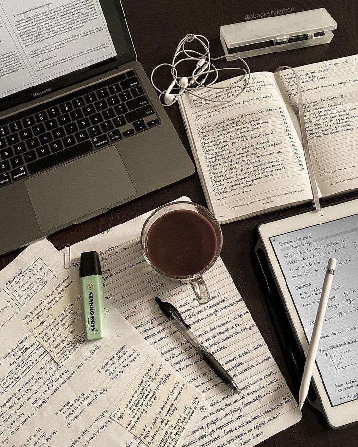 Study desk with coffee and notes